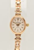 A LADIES 9CT GOLD 'EXCALIBUR' WRISTWATCH, quartz movement, oval silvered dial signed 'Excalibur,