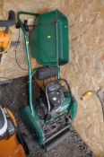 A QUALCAST CLASSIC PETROL 35s PETROL CYLINDER MOWER with grass box (engine pulls freely but hasn't