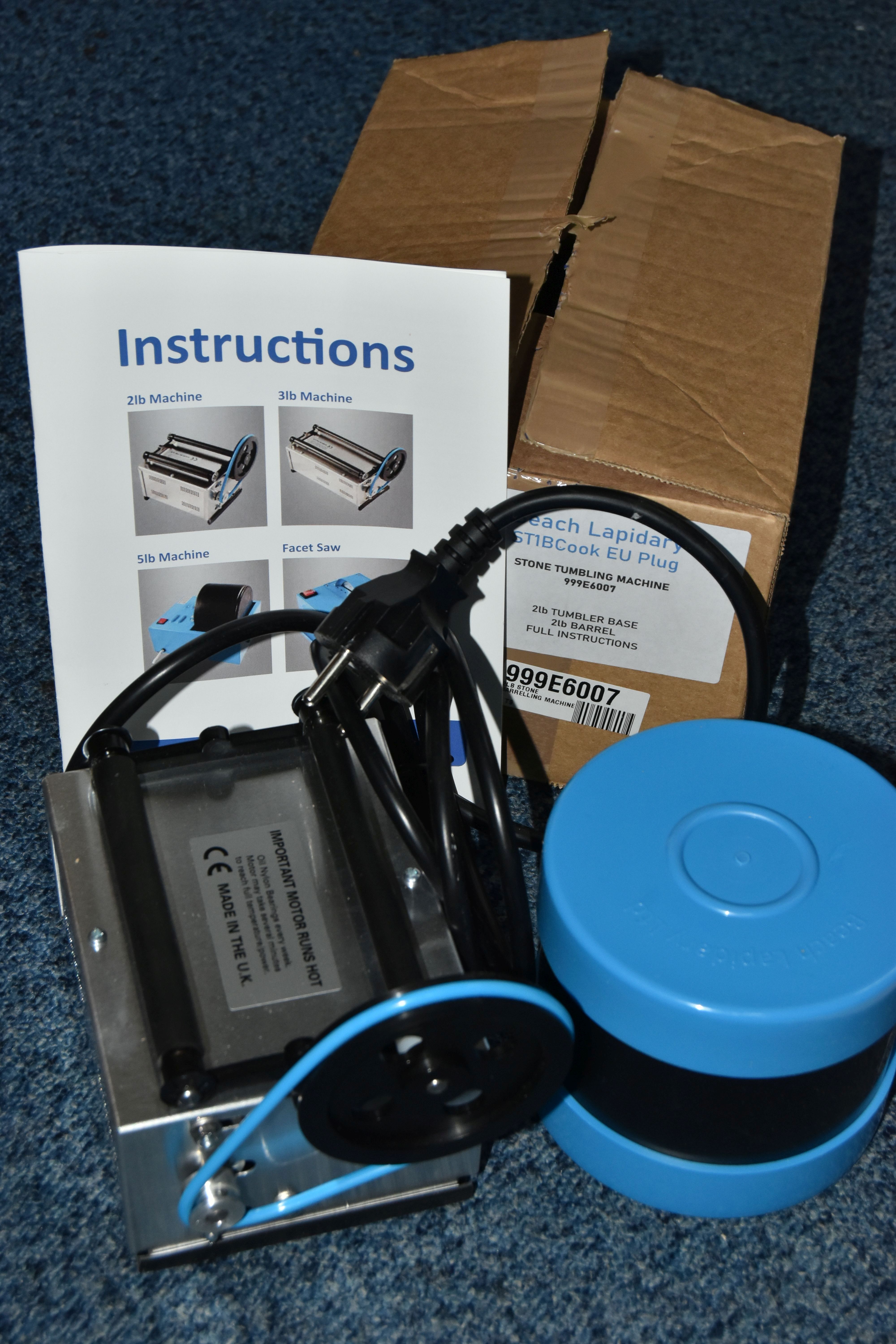A BOXED 'BEACH LADPIDARY ST1BCOOK, STONE TUMBLING MACHINE', 2lb tumbler, with instructions,