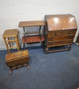 A 20TH CENTURY OAK BUREAU, the fall front door enclosing a fitted interior, above three drawers,