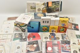A PLASTIC TUB OF ROYAL MINT MOSTLY SEALED UNOPENED COINS AND COIN PACKS, to include Tales of the