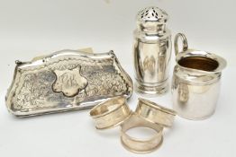 A SMALL GROUP OF SILVER ITEMS, to include three napkin rings, with foliate pattern and vacant