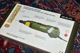 A BOXED PROXXON PRECISION DRILL/GRINDER, FBS 240/E, complete with 43 high quality bits and
