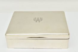 A GEORGE V SILVER CIGARETTE BOX OF RECTANGULAR FORM, engraved monogram to the hinged lid,