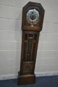 AN EARLY 20TH CENTURY OAK CASED WESTMINSTER GLOCKENSPIEL CLOCK, the circular convex glass door