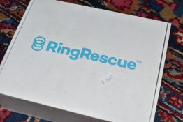 A BOXED 'RING RESCUE' COMPRESSION DEVICE RING REMOVING TOOL, product number 999 7252, compression