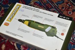 A BOXED PROXXON PRECISION DRILL/GRINDER, FBS 240/E, complete with 43 high quality bits and