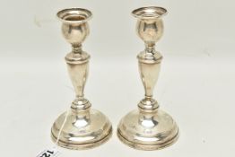 A PAIR OF EARLY 20TH CENTURY SILVER CANDLESTICKS, of baluster form with circular bases, hallmark for