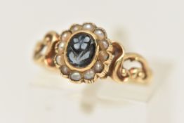 A VICTORIAN 'FORGET ME NOT' RING, carved sardonyx depicting a forget me not flower, set with a