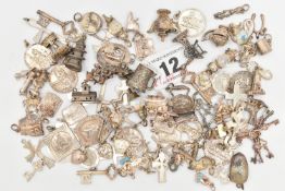 AN ASSORTMENT OF WHITE METAL CHARMS, assorted charms including St Christophers, tea pots, hearts,