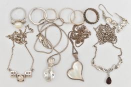 A SMALL BAG OF JEWELLERY, a silver ring set with three red stones, hallmarked Birmingham, a full