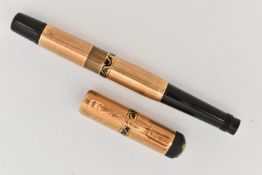 A 'MONTBLANC' SMALL YELLOW METAL FOUNTAIN PEN, engine turned pattern with black enamel detail,