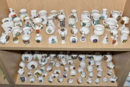 A QUANTITY OF WH GOSS CRESTED WARE VESSELS, over ninety pieces, in forms to include an ancient