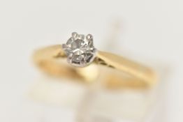 AN 18CT GOLD DIAMOND SINGLE STONE RING, set with a round brilliant cut diamond, measuring