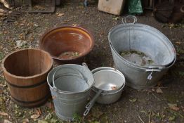 TWO SIZED GALVANISED BATHS, two buckets, etc, along with a modern coopered bucket and a glazed