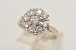 AN 18CT WHITE GOLD DIAMOND CLUSTER RING, designed as two tiers of brilliant cut diamonds,