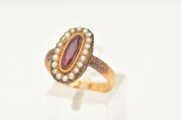 A MID VICTORIAN CLUSTER RING, set with an elongated oval shape faceted red paste, within a seed