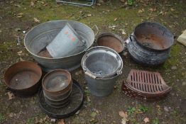 A SELECTION OF METALWARE, to include two cast iron cooking pots, in two sizes, a galvanised oval