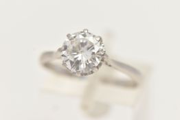 A DIAMOND SINGLE STONE RING, set with a round brilliant cut diamond, within an eight claw setting,