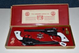 A BOXED B.C.M. OUTLAW GUNS SET, comprising a pair of replica Remington Apache calibre .44 cap firing