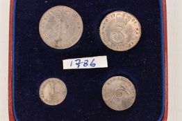 A GEORGE III MAUNDY SET OF CASED 1786 4d TO 1d
