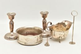 A SELECTION OF MAINLY SILVERWARE, to include a pair of silver dwarf candlesticks, hallmark for