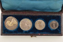 A CASED SET OF FOUR ANNE MAUNDY COINS 4d TO 1d 1706