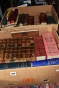 Two Boxes of Books and Maps containing over thirty-five book titles, many leather bound, dating from