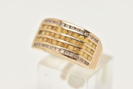A 14CT GOLD GEM SET RING, designed as three channel set rows of circular cut yellow stones