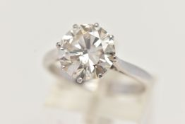 A DIAMOND SINGLE STONE RING, set with a round brilliant cut diamond, within an eight claw setting,