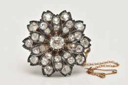 A LATE VICTORIAN DIAMOND FLORAL BROOCH, set with a principal cushion-shape old-cut diamond,