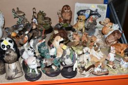 A LARGE QUANTITY OF ANIMAL AND BIRD ORNAMENTS, approximately forty ornaments comprising a Country