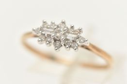 A 9CT GOLD DIAMOND DRESS RING, designed as a central brilliant cut diamond flanked by horizontal
