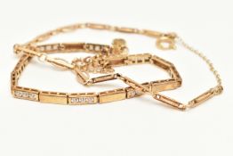 A 9CT GOLD BRACELET AND A YELLOW METAL BRACELET, the first a yellow gold fancy link bracelet with