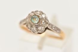 A GEM SET CLUSTER RING, single cut diamonds surrounding a light blue paste stone, set in white
