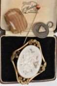 FOUR ITEMS OF JEWELLERY, to include a late Victorian rectangular hardstone brooch, a late