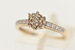 A 9CT GOLD DIAMOND CLUSTER RING, designed as a central cluster of brilliant cut brown diamonds, with