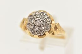 A DIAMOND CLUSTER RING, five single cut diamonds, set in a white metal illusion setting with star