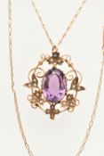 AN AMETHYST AND SPLIT PEARL PENDANT NECKLACE, designed as a central oval amethyst within a scrolling