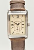 A GENTLEMAN'S BURBERRY WRISTWATCH, the rectangular cream coloured face with Roman numerals, a