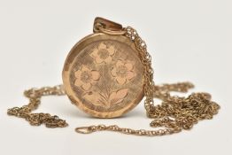 A YELLOW METAL LOCKET AND 9CT GOLD CHAIN NECKLACE, a circular form locket with floral detail,