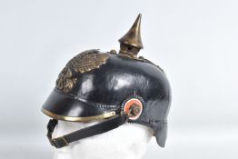 A REPRODUCTION GERMAN PICKLEHAUBE HELMET, this comes with a liner and chin strap plus cockades and a