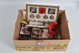 A COLLECTION OF WWI AND WWII MEDALS, RIBBON BARS, BADGES, ASSORTED EPHEMERA AND A CERAMIC POPPY, the
