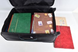 SUITCASE WITH LARGE COLLECTION OF STAMPS. We note interest in South Africa stamps as mint and FDC.