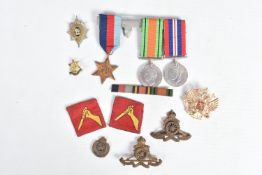 A COLLECTION OF WWII MEDALS, BADGES AND FROMATION PATCHES, the medals include 1939-45 war medal