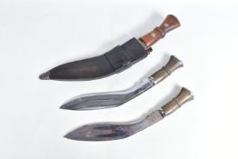 THREE KUKRI STYLE KNIVES, the three Kukris all have blades that are not marked, one comes in its