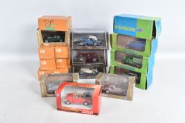 EIGHTEEN BOXED DIECAST MODEL VEHICLES, to include a Schuco Junior line 1:43 scale VW Kafer Cabrio in