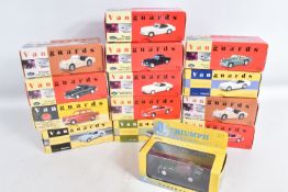 FOURTEEN BOXED 1:43 SCALE DIECAST VANGUARDS TRIUMPH MODEL VEHICLES, to include two Pale Yellow