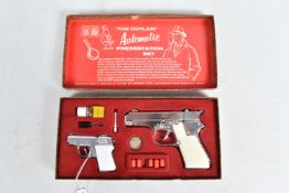 A BOXED B.C.M. 'THE OUTLAW' AUTOMATIC PRESENTATION SET, appears complete, except missing one