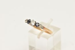 A GEM SET FIVE STONE RING, set with two graduating synthetic blue sapphires and colourless